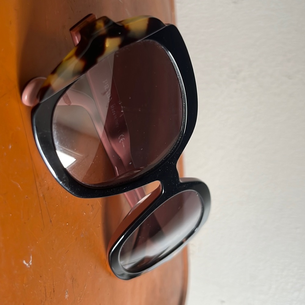 Prada sunglasses. Gently worn. No scratches.comes with case.